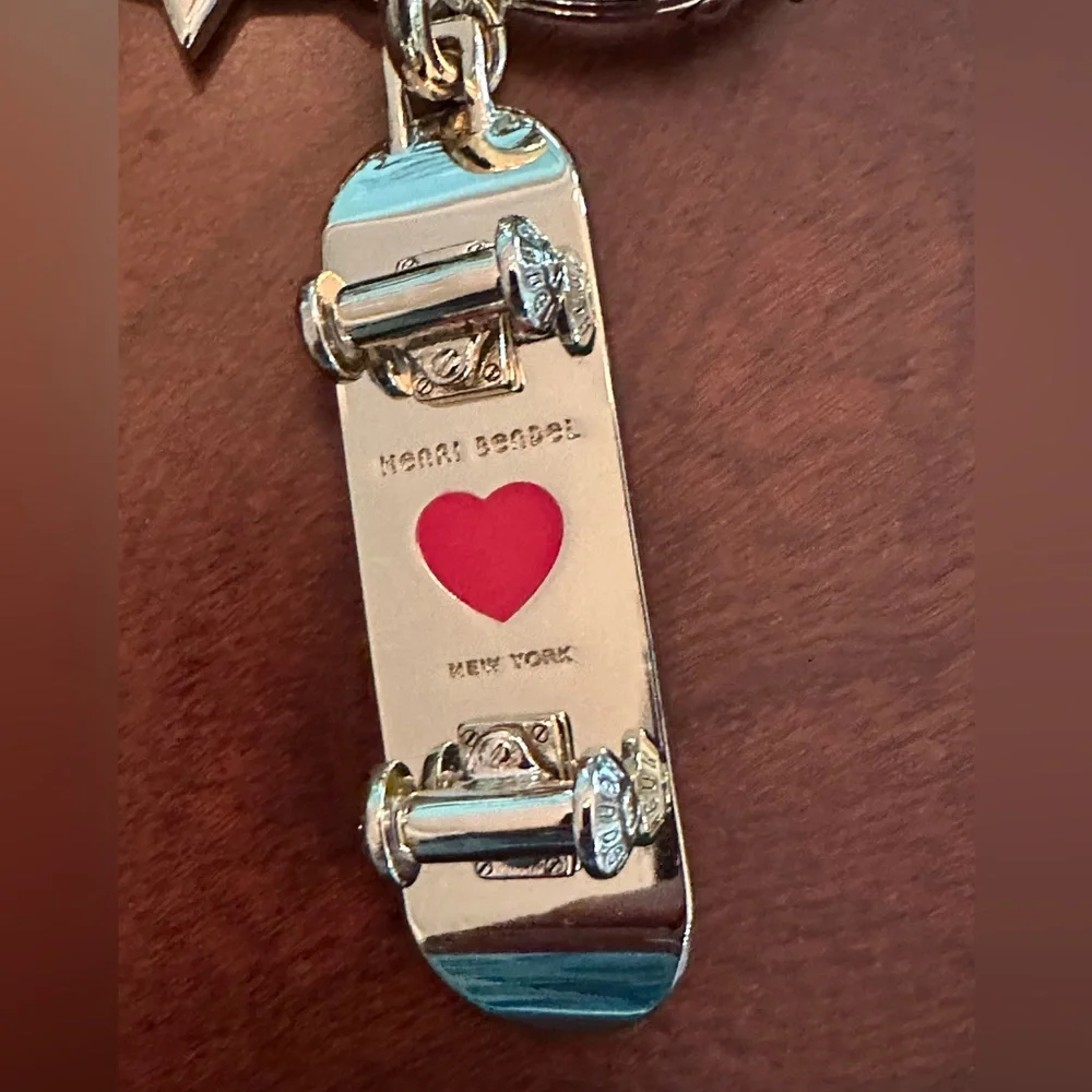 Incredibly HTF Henri Bendel Skateboard/Star Keychain Bag Charm NWT! Mint!